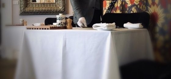 Felix setting the table at Highfield Retreat