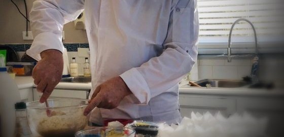 Marcus at work in the kitchen at Highfield Retreat